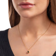 Closer photo of model with simple round picture necklace