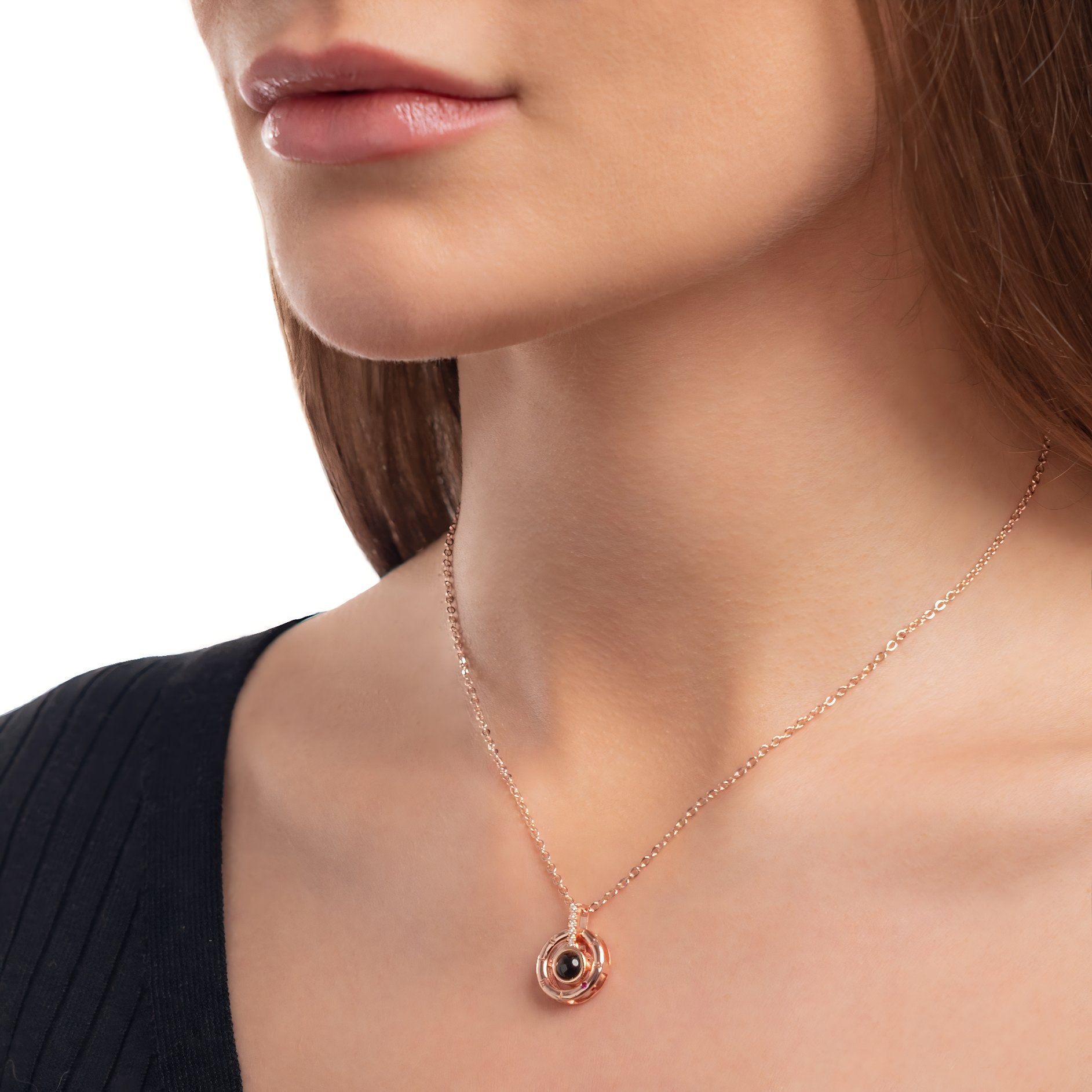 Close photo of memorial necklace on model